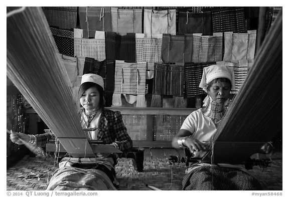 Weaving workshop with Kayan women of the Padaung tribe. Inle Lake, Myanmar (black and white)