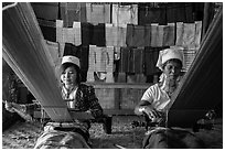 Weaving workshop with Kayan women of the Padaung tribe. Inle Lake, Myanmar ( black and white)