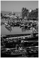 Parked boats and market. Inle Lake, Myanmar ( black and white)