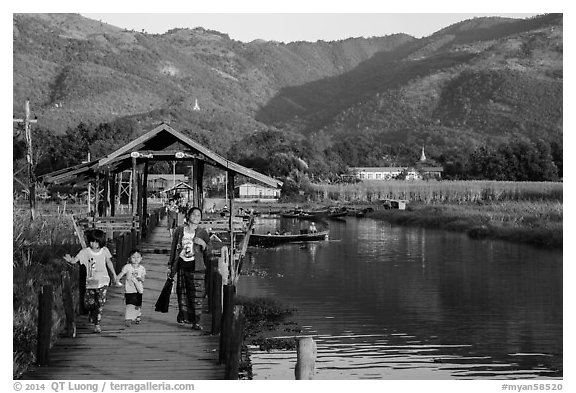 Pier and hills, Maing Thauk Village. Inle Lake, Myanmar (black and white)