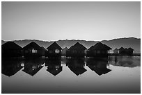 Cottages on stilts at dawn. Inle Lake, Myanmar ( black and white)