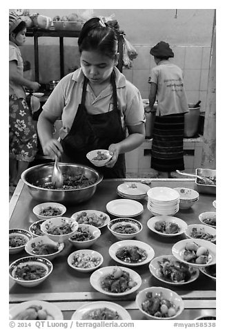 Cooks serving Burmese food. Bago, Myanmar (black and white)