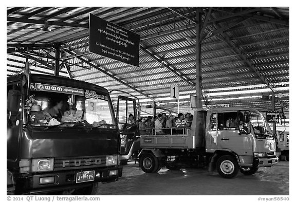 Busses and sign at base station. Kyaiktiyo, Myanmar (black and white)