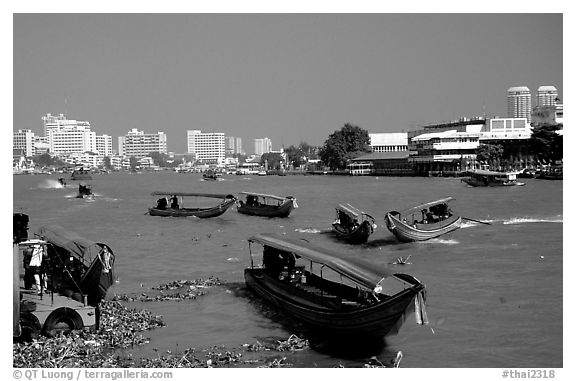 Chao Phraya river crowded with boats. Bangkok, Thailand (black and white)
