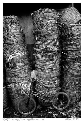 Bicycle and baskets near market. Bangkok, Thailand (black and white)
