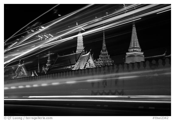 Wat Phra Kaew seen through the lights of traffic. Bangkok, Thailand