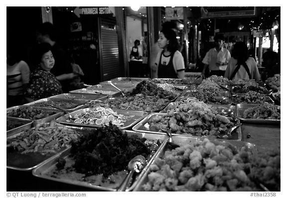 Variety of spicy foods in a market. Bangkok, Thailand (black and white)