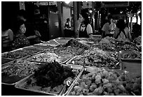 Variety of spicy foods in a market. Bangkok, Thailand ( black and white)