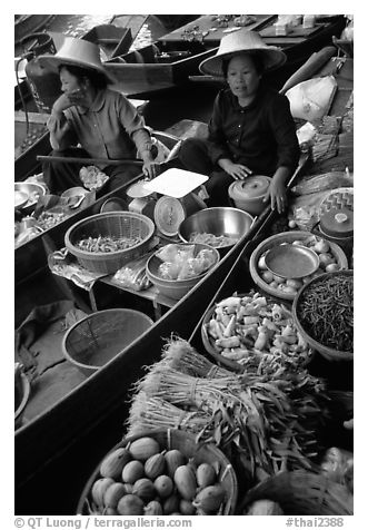 Women selling fruits and vegetables, Floating market. Damnoen Saduak, Thailand (black and white)