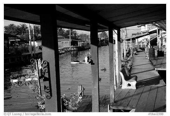 Houses along canal. Damnoen Saduak, Thailand (black and white)