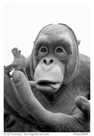 Monkey on monkey statue. Lopburi, Thailand (black and white)