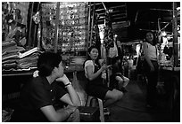 Vendors in the Night Bazaar. Chiang Mai, Thailand (black and white)