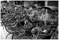 Tricycle drivers. Chiang Rai, Thailand (black and white)