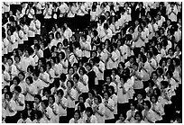 School girls during morning prayer before class. Chiang Rai, Thailand ( black and white)