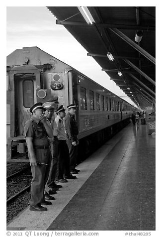 Attendants and train, Hualamphong station. Bangkok, Thailand