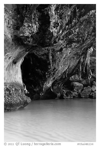 Limestone overhang and turquoise waters, Rai Leh. Krabi Province, Thailand