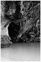 Limestone overhang and turquoise waters, Rai Leh. Krabi Province, Thailand ( black and white)