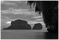 Limestone stalactite framing islets, Rai Leh. Krabi Province, Thailand ( black and white)