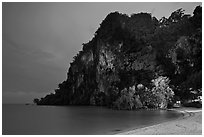 Cliffs and trees at night, Rai Leh East. Krabi Province, Thailand (black and white)