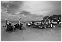 Long tail boats on beach, Hat Rai Leh West. Krabi Province, Thailand ( black and white)