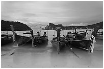 Long tail boats and bay, Ao Lo Dalam, Ko Phi-Phi island. Krabi Province, Thailand ( black and white)