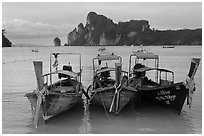 Boats, bay, and cliffs,  Ao Lo Dalam, Ko Phi-Phi island. Krabi Province, Thailand ( black and white)