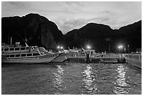 Harbor and cliffs at dusk, Ko Phi-Phi island. Krabi Province, Thailand (black and white)