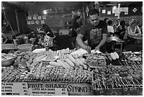 Restaurant with seefood on skewers, Phi-Phi island. Krabi Province, Thailand ( black and white)