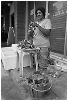 Woman selling grilled seafood, Tonsai village, Ko Phi-Phi island. Krabi Province, Thailand ( black and white)