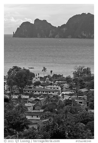Village, bay and cliffs, Ko Phi-Phi island. Krabi Province, Thailand (black and white)