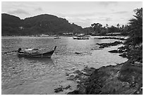 Long tail boat, and Tonsai village, Ko Phi-Phi Don. Krabi Province, Thailand (black and white)