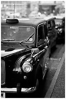 Black London taxis. London, England, United Kingdom (black and white)