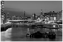 HMS Belfast, London Bridge, and Thames at night. London, England, United Kingdom ( black and white)