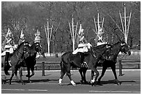 Horse guards riding near Buckingham Palace. London, England, United Kingdom (black and white)