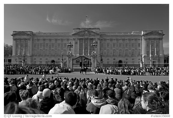 Crowds during  the changing of the guard in front of Buckingham Palace. London, England, United Kingdom (black and white)