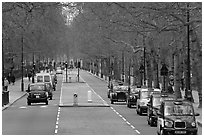 Black cabs and street near Saint James Park with. London, England, United Kingdom (black and white)