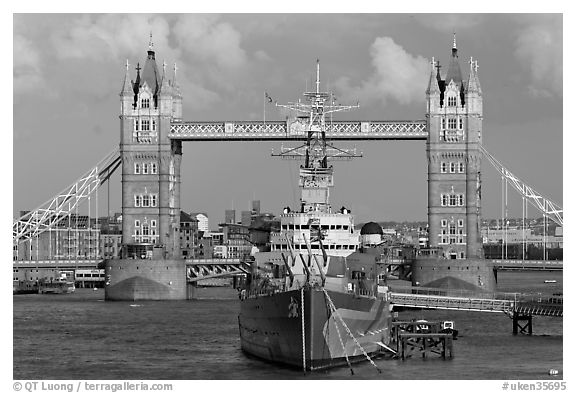HMS Belfast cruiser and Tower Bridge, late afternoon. London, England, United Kingdom (black and white)