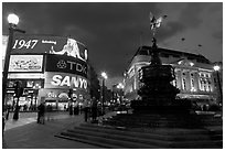 Neon advertising and Eros statue, Piccadilly Circus. London, England, United Kingdom (black and white)