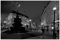 Eros statue and streets at dusk, Picadilly Circus. London, England, United Kingdom (black and white)