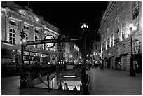 Underground station entrance at dusk, Piccadilly Circus. London, England, United Kingdom (black and white)