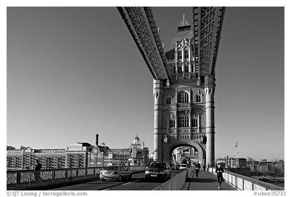 Jogger and South Tower of Tower Bridge,  early morning. London, England, United Kingdom (black and white)