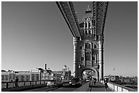Jogger and South Tower of Tower Bridge,  early morning. London, England, United Kingdom (black and white)