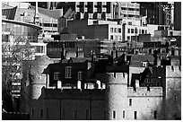 Tower of London and modern buildings. London, England, United Kingdom (black and white)