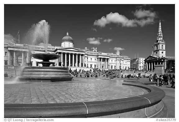Fountain, National Gallery, and  St Martin's-in-the-Fields church, Trafalgar Square. London, England, United Kingdom (black and white)