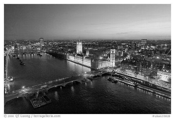 Aerial view of Thames River, Westmister Bridge and Palace at dusk. London, England, United Kingdom