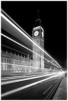 Lights from a moving bus, Houses of Parliament, and Big Ben at night. London, England, United Kingdom (black and white)