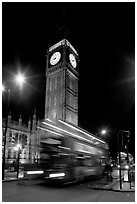 Big Ben and double decker bus in motion at nite. London, England, United Kingdom (black and white)