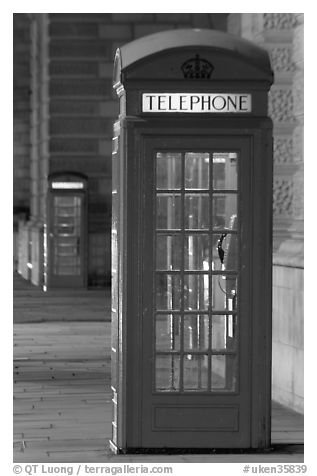 Red phone booth at night. London, England, United Kingdom (black and white)