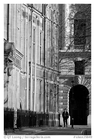 Man walking in street near Parliament Square. London, England, United Kingdom (black and white)
