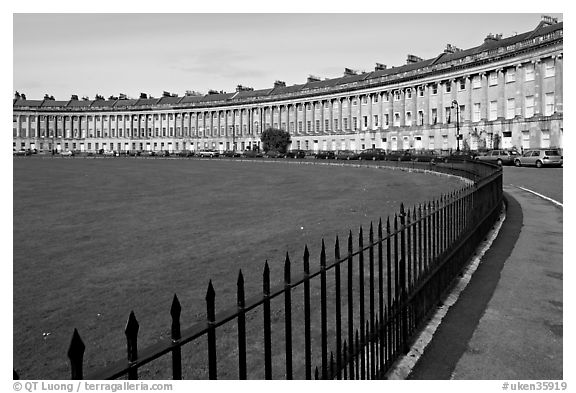 Fence, lawn, and Royal Crescent. Bath, Somerset, England, United Kingdom (black and white)